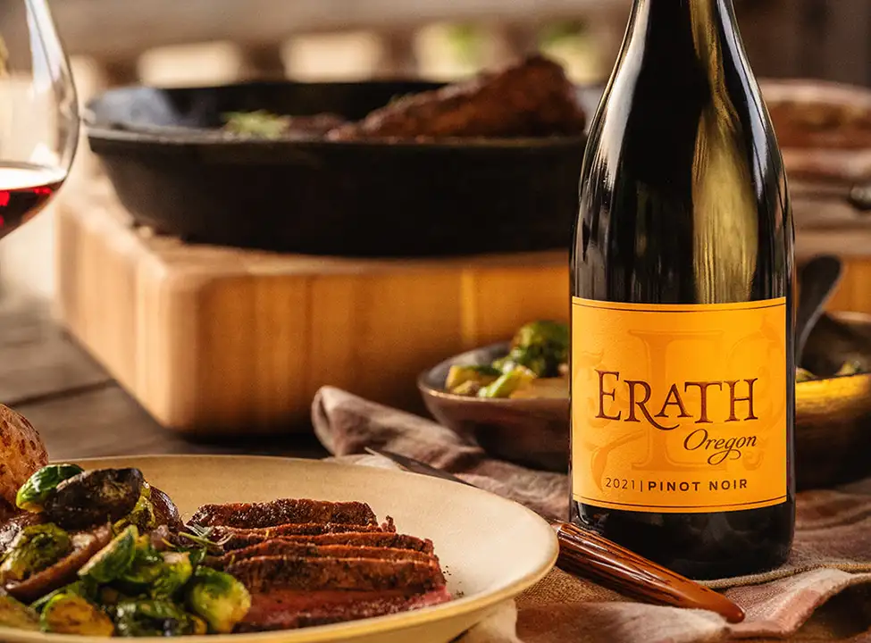 Erath wines placed on a dinner table.
