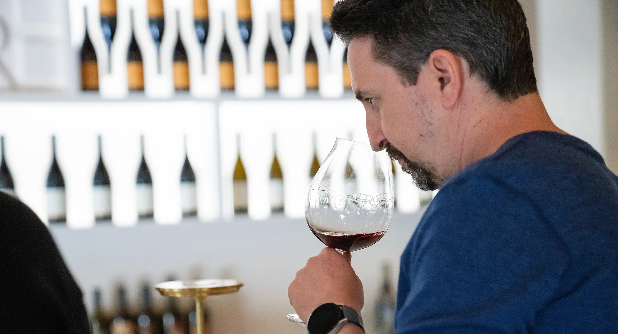 Erath Winery Club member drinking wine.