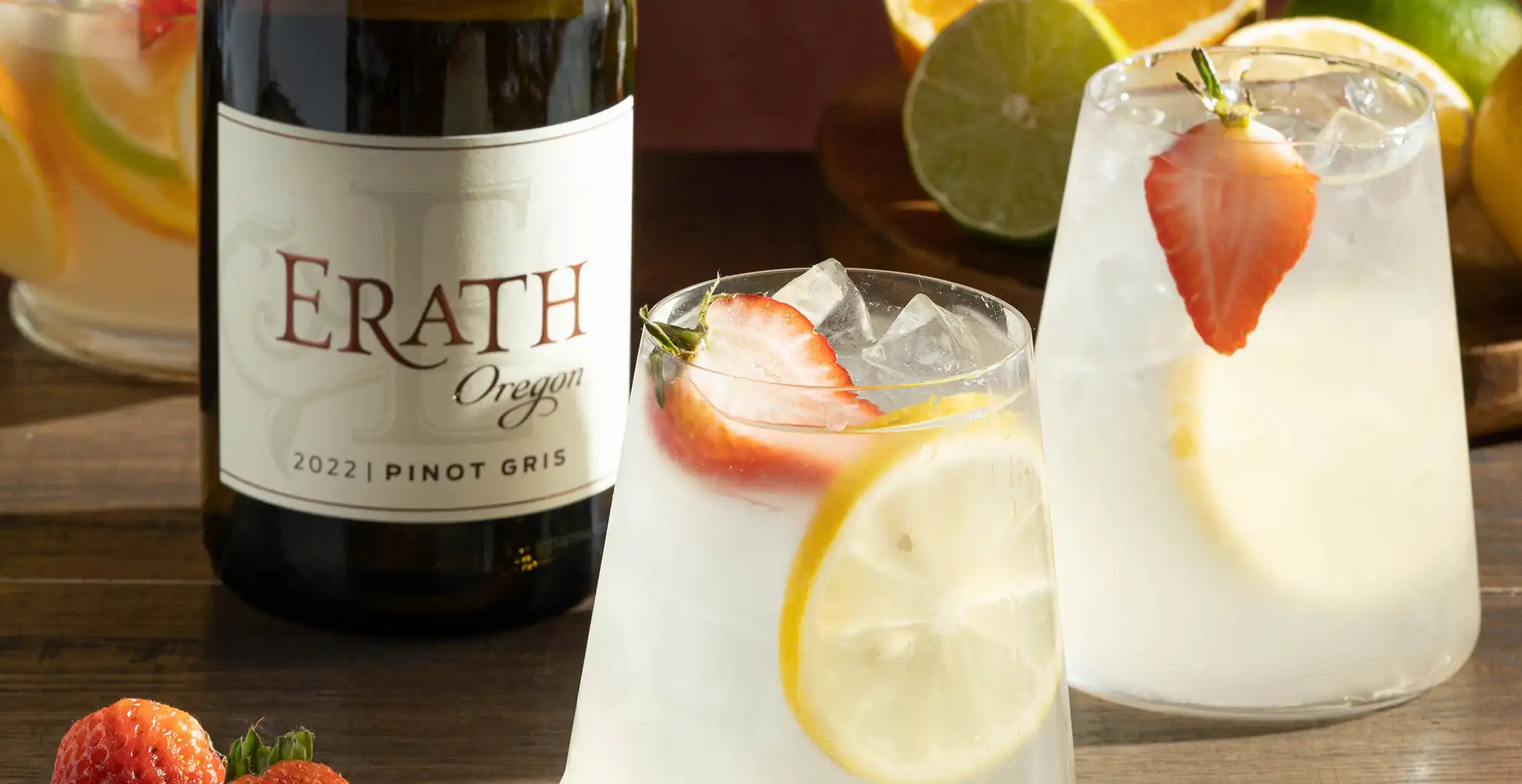 bottle of erath oregon pinot gris with two glasses of strawberry sangria